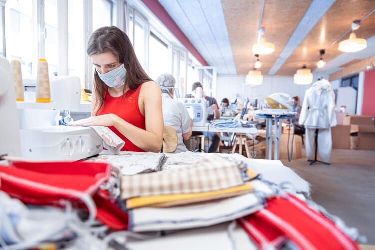 A home sewing workshop mobilised to produce protective equipment, April 2020.